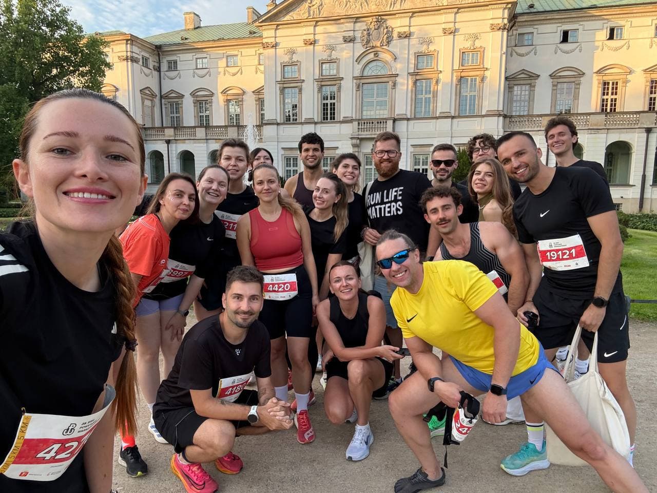 Big URC group photo after a race in front of a Warsaw palace